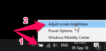 Nhấn chuột phải lên biểu tượng pin trên thanh taskbar chọn Adjust screen brightness